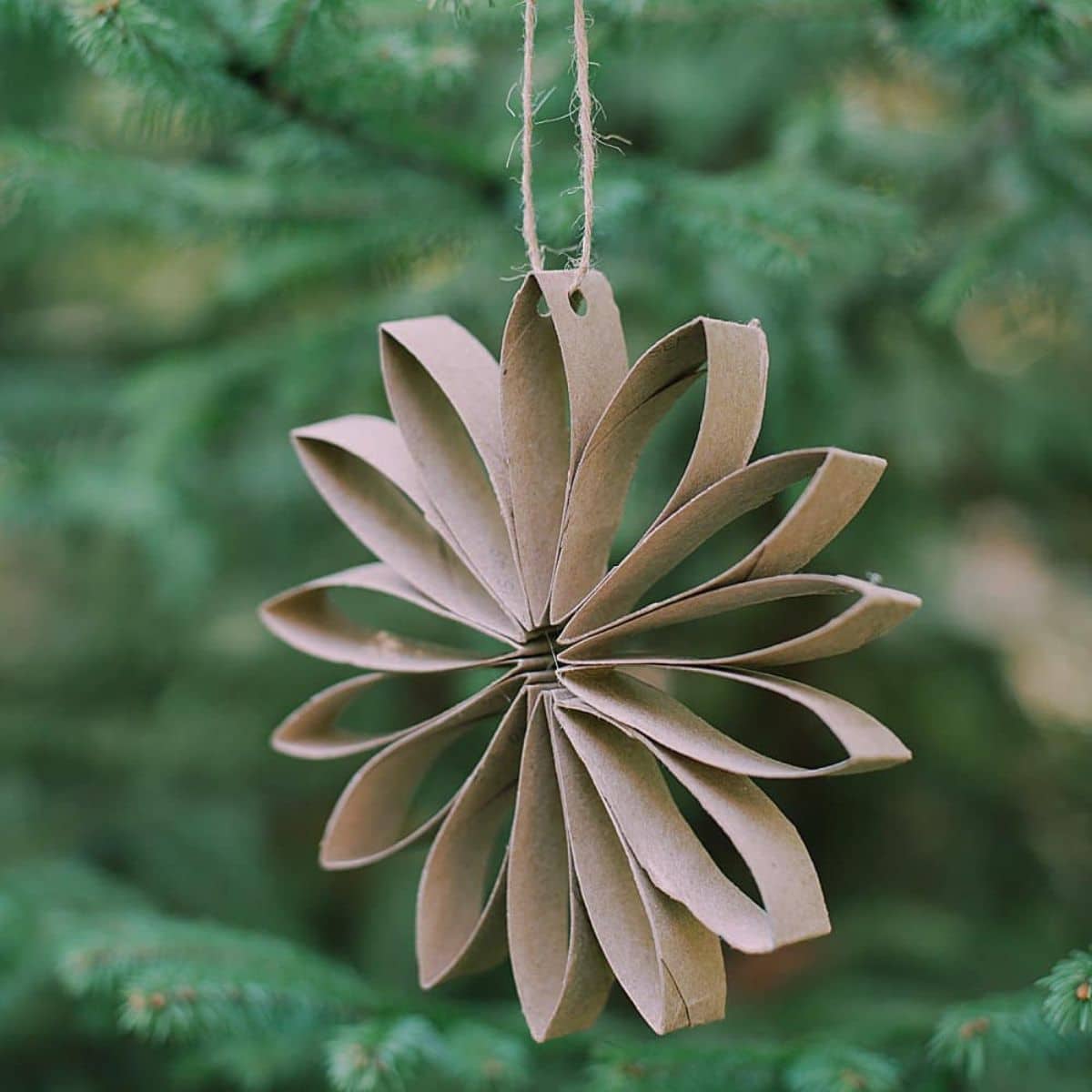 How to make a toilet paper flower ornament using the recycled cardboard tubes inside a roll of toilet paper.