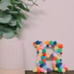 How to make a pom pom letter.