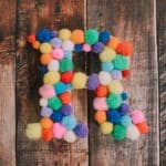 How to make a pom pom letter.