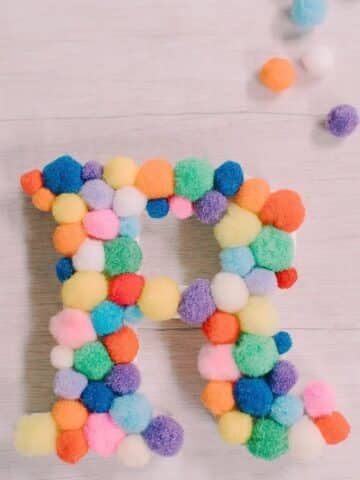 How to make a pom pom letter.